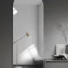 Frameless arched mirror without a light and polished edge.