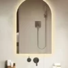 Arched frameless mirror with warm white led light. Mirror is currently on sale.