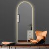 Arched frameless mirror with warm white led light. Mirror is currently on sale.