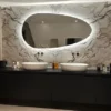 Irregular shaped mirror with a cool white LED back light